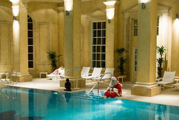 Santa relaxing in the pool at the Chewton Glen Spa