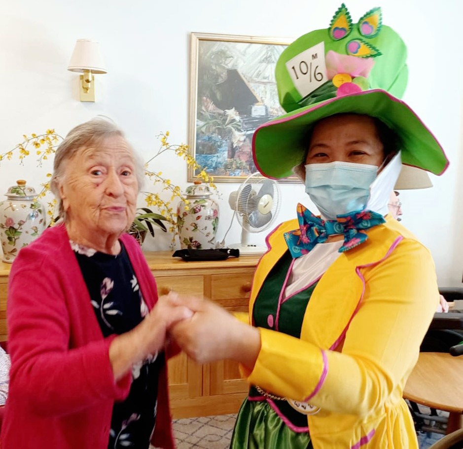 Kingfishers Resident Joan Lakeman and companionship team leader Rose Arcellana dancing