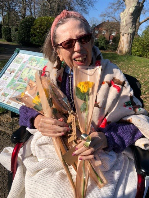 Residents at Colten's Court Lodge in Lymington gave out personalised blooms to visitors of the town's Woodside Park. Pictured here is Joan Stedman.